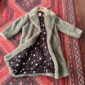 Mint green teddy bear faux fur XL coat with pockets and silver star lining.